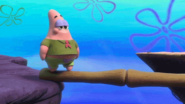 patrick star from spongebob squarepants is standing on a wooden bridge