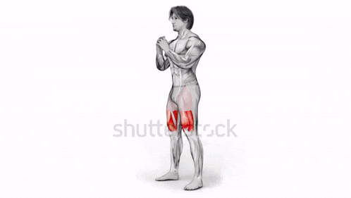 a man is standing with his legs crossed and a red spot on his thigh .