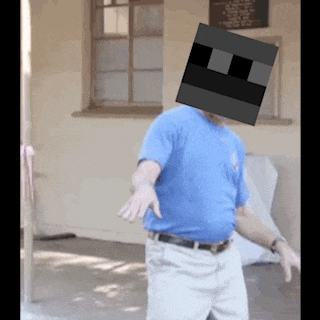 a man in a blue shirt has a square on his head ..
