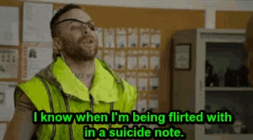 a man in a yellow vest is talking about being flirted with in a suicide note