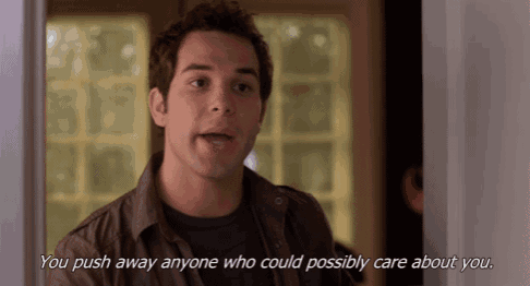 a man in a brown jacket says you push away anyone who could possibly care about you