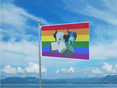 a rainbow flag with a cow on it is flying in the wind