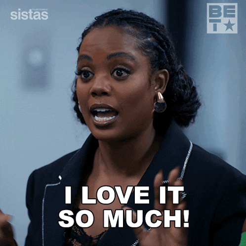 a woman says " i love it so much " in front of a be tv logo