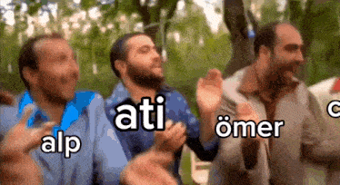 a group of men applauding with the words ati alp and omer written on the bottom