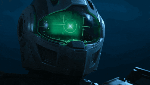 a close up of a futuristic helmet with a green screen that says ' a ' on it