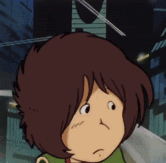 a close up of a cartoon character 's face with a sad look on his face