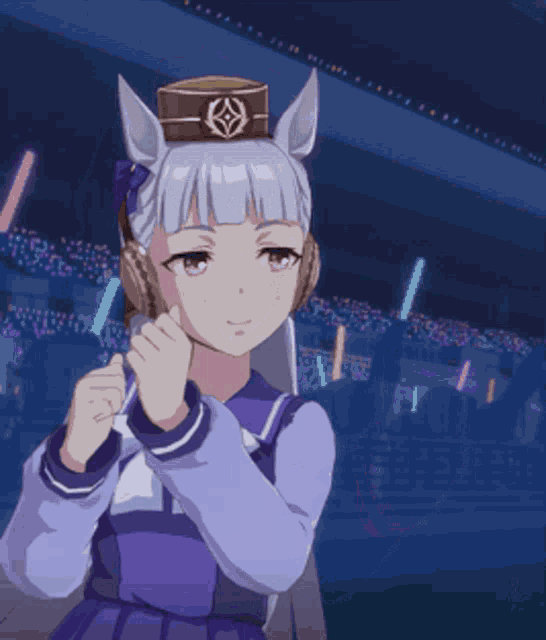 a girl in a purple dress is wearing headphones and a hat with the letter k on it