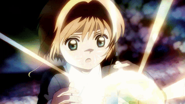 a girl with a surprised look on her face is holding a glowing object
