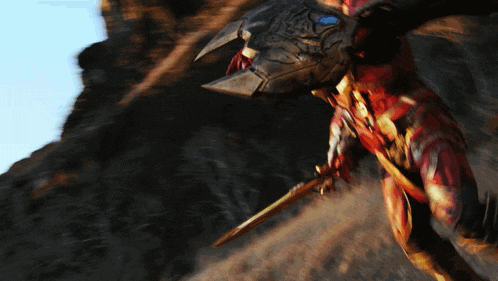 a blurred image of a person with a sword and a helmet