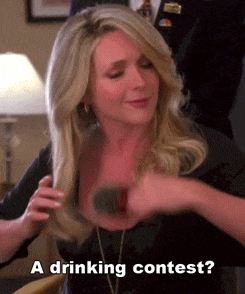 a woman with a drinking contest written on her chest
