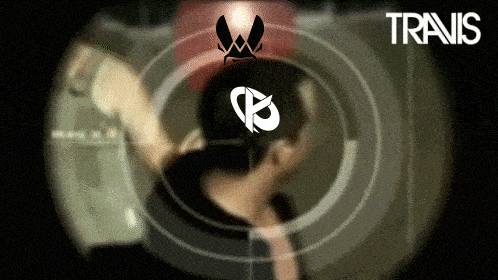 a blurred image of a person with the word travis on the bottom right
