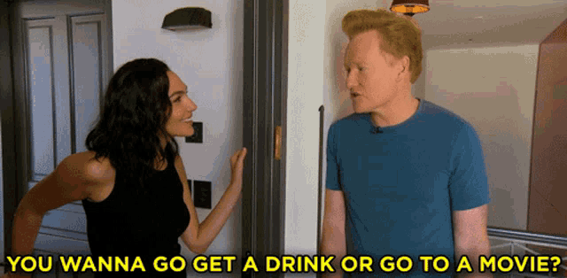 a man and a woman are standing next to each other with the words you wanna go get a drink or go to a movie