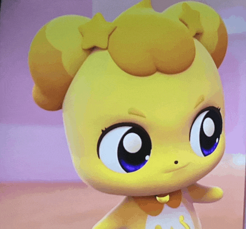 a close up of a cartoon character with a star on its head