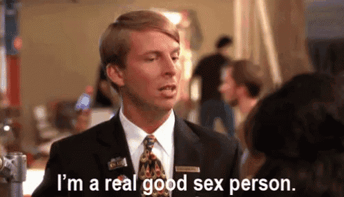 a man in a suit and tie is talking to a woman and saying `` i 'm a real good sex person '' .