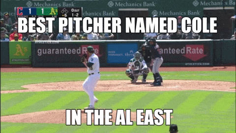 a baseball game is being played and the pitcher named cole is in the al east
