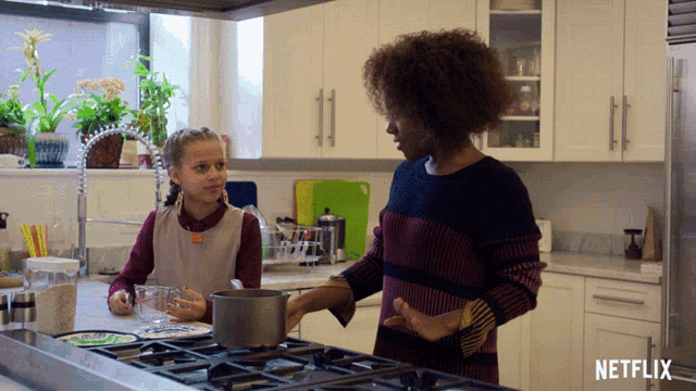 two women in a kitchen with a netflix logo in the corner