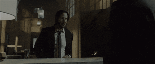a man in a suit says no i thought not in a dark room