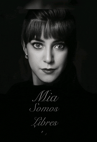 a black and white photo of a woman with mia somos libres written below her