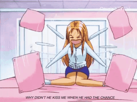 a girl sitting on a bed surrounded by pink pillows with the words why didn 't he kiss me