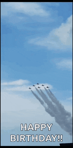a happy birthday greeting with a blue jet flying through the sky