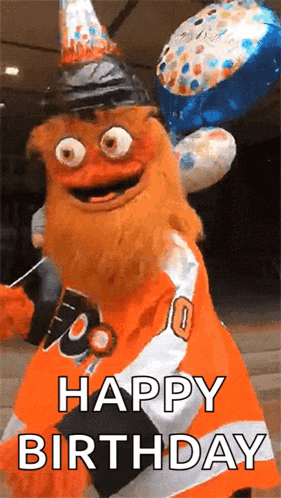 a mascot is wearing a birthday hat and holding balloons and says happy birthday .