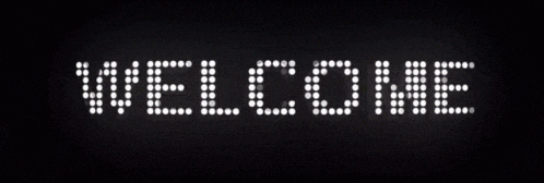 the word welcome is made up of dots on a black background .