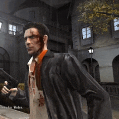 a man with blood on his face is wearing a leather jacket