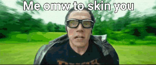 a man wearing glasses and a jacket says " me omw to skin you "