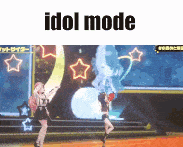 two girls are dancing on a stage with the words idol mode written above them