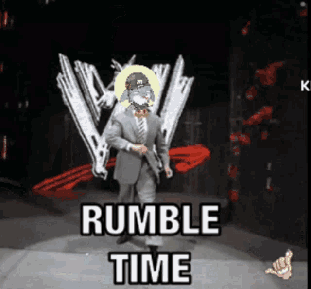 a man in a suit and tie is dancing in front of a w logo and the words rumble time