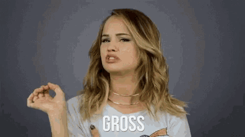 a woman is making a funny face and the word gross is on her shirt