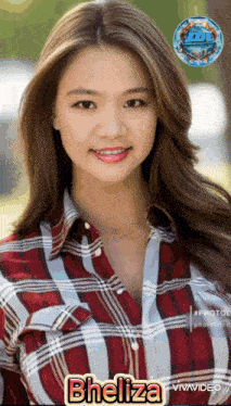 a woman wearing a plaid shirt has the name bheliza on her face