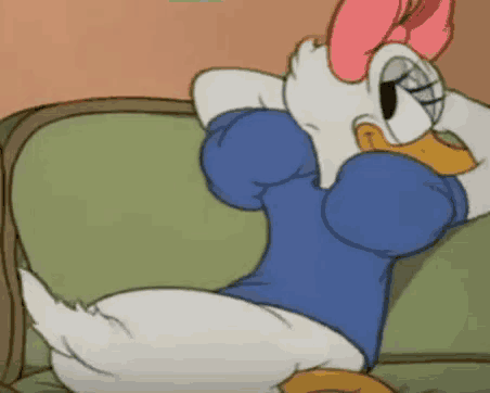 a cartoon of daisy duck laying on a couch with her legs crossed