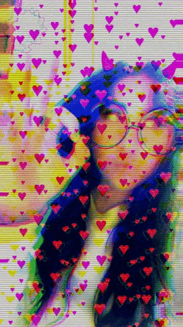 a girl wearing glasses is surrounded by hearts