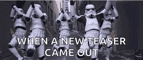 a group of stormtroopers are walking down a street with the words when a new teaser came out above them .