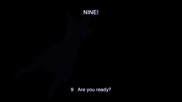 a person in a white dress is standing in front of a blue background and says nine are you ready