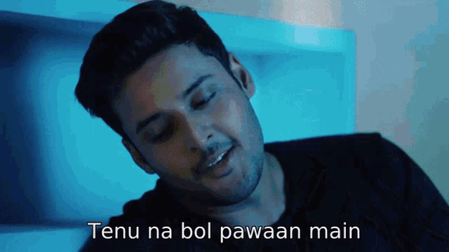 a man laying on a bed with the words tenu na bol pawaan main written below him