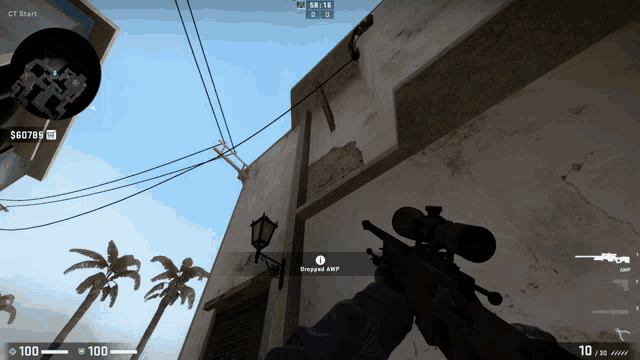 a person holding a sniper rifle in front of a building that says stopped amp on it