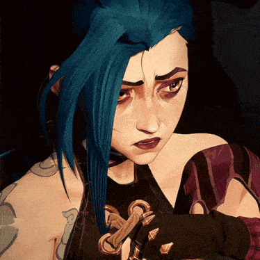 a close up of a woman with blue hair and a tattoo on her arm