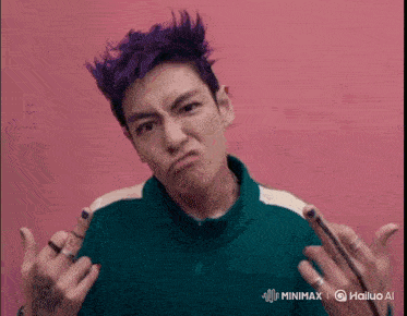 a man with purple hair and a green jacket is making a funny face