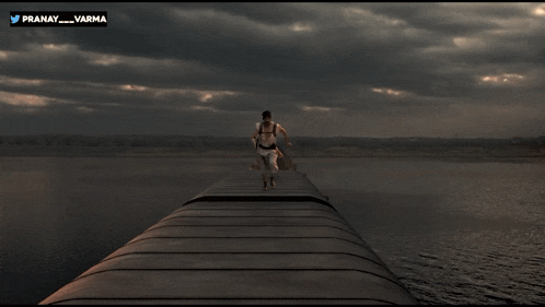 a picture of a person running on a bridge with the name pranay varma on the bottom