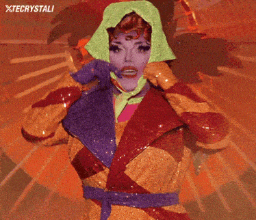 a woman in a colorful costume with xtecrystali written in the corner