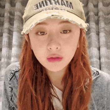 a woman wearing a hat that says " vietnam " on it