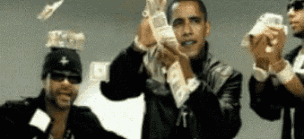 a group of men are holding lots of money in their hands and throwing it in the air .