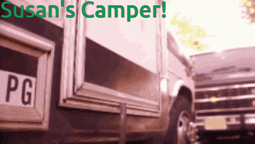 a sign that says susan 's camper is above a camper