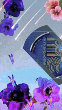 a picture of purple flowers and butterflies surrounding a can of milks