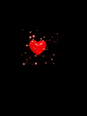 a picture of a man and a woman with a red heart in the middle