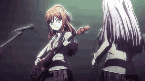 a girl is playing a guitar and singing into a microphone .
