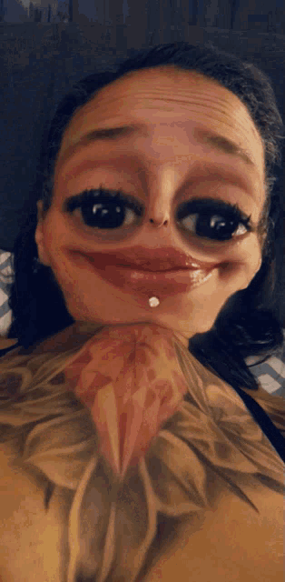 a woman with a tattoo of a flower on her chest makes a funny face