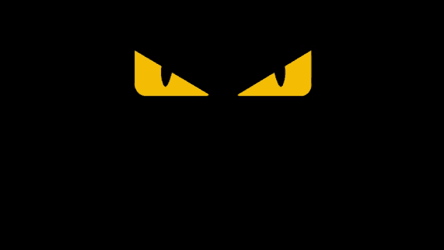a black background with a pair of yellow eyes